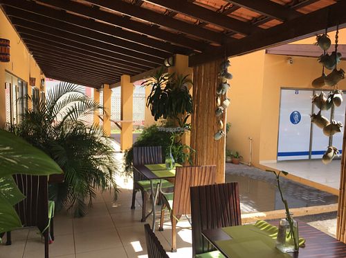 the lovely porch area in front of the restaurant  at Green Food Service in Oranjestad
