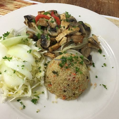 sautéed tofu and mushrooms with quinoa and cabbage and onions at Green Food Service in Oranjestad