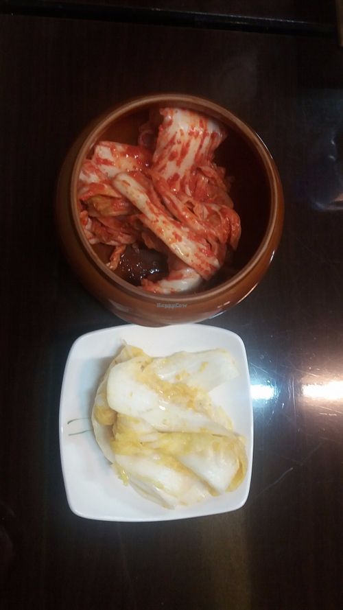red and white kimchi at Chorokddeul Green Field - 초록뜰식당 in Seoul