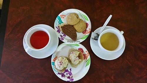 Tea, vegan cupcakes and cookies.  Notice the New Leaf on the cookie!  :0) at New Leaf Cafe in Tampa