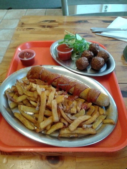 Currywurst and chips with party balls (meatballs) at Yellow Sunshine in Berlin
