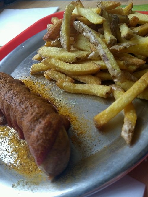 Currywurst mit pommes at Yellow Sunshine in Berlin