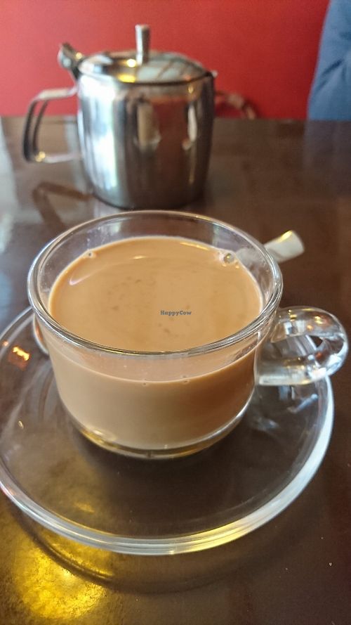 Small pot of vegan chai latte at Aniyor Vegetarian Restaurant in Kathmandu