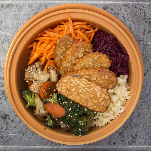Tempeh buddah bowl with traditionally prepared sides at HBH Vilnius in Vilnius