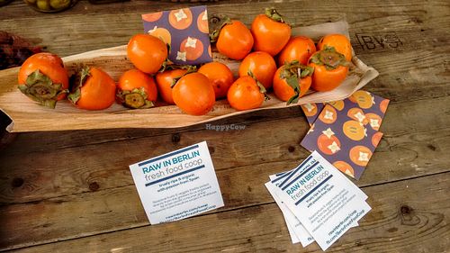 Small type of persimmon.  at Raw in Berlin Fresh Food-Coop in Berlin