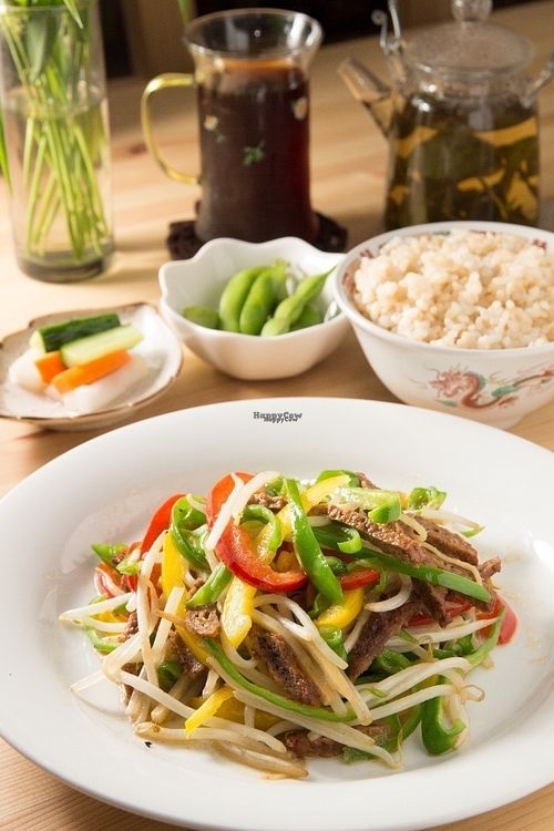 Chin Jow Roe Tsu Set, Green and red peppers, Tofu meat, mixed vegetables. Brown or white rice, Soya Beans pickled vegetables and a choice of tea or coffee. at Seven Bells Cafe in Tachikawa