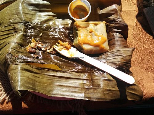 Banana leaf wrapped tamale at Guudbelly in Houston