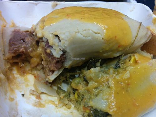 Delicious vegan tamales, with sauce. at Guudbelly in Houston