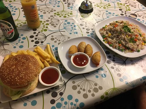 Chicken burger, curry puffs and fried rice! at Inala Vegan Restaurant in Inala