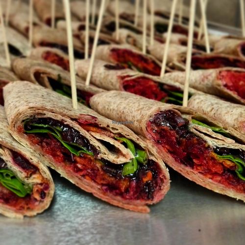 Wraps with black rice, tomato-hummus, beet salad and tahini dressing.  at Ficus in Oslo