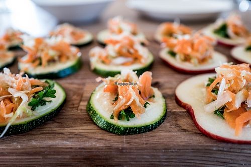 Fermented salad on zucchini and apple bites. at Ficus in Oslo