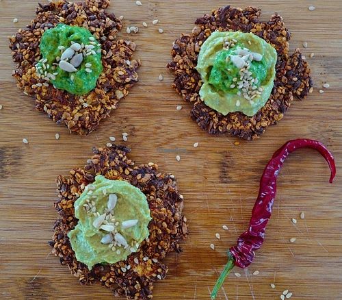 Sundried tomato crackers with green spreads at Ficus in Oslo