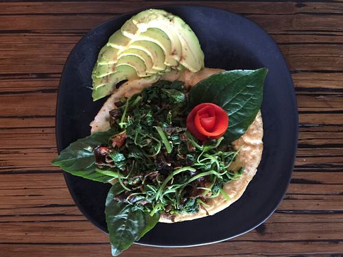 Egg white pizza with spinach, tomatoes and mushrooms. at Alice's Restaurant  in Chiang Mai