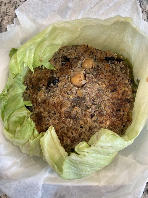 Vegan guac burger in a lettuce bun at Epik Burger in Jacksonville