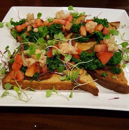 Kale and white bean bruschetta on whole grain bread at GreenFare Organic Cafe in Herndon
