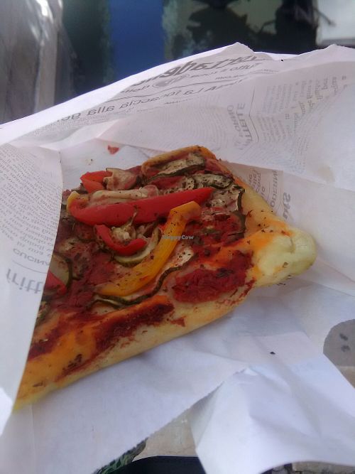 Baked pizza by slice at Rialto Biocenter in Venice