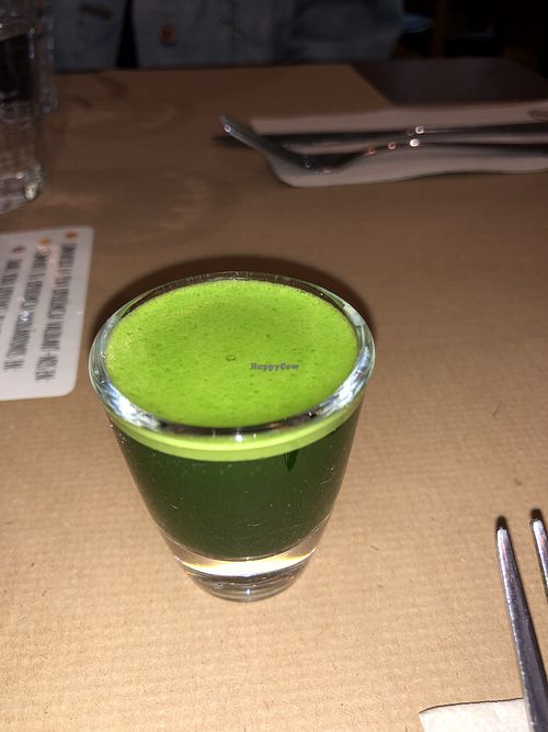 Wheatgrass shot at Petit Brot - Cold Press Raw Eco in Barcelona