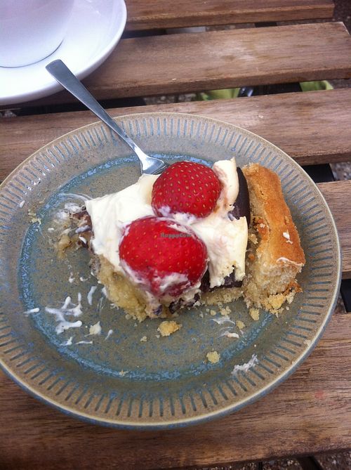 I couldn't resist several bites before taking a bite of the exquisite Danish traditional cake - jordbærtærte med mazarinbund! at Kaf in Copenhagen