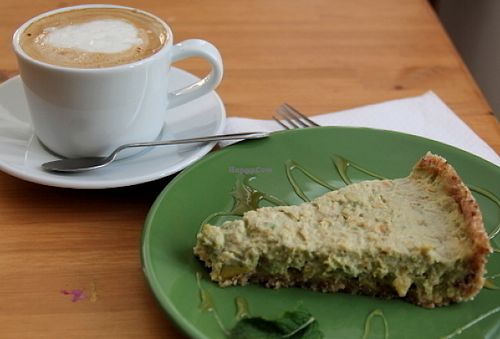 Cappucino with vegan milk and raw avocado pie.  at Dona Flor Cafe in Cascais