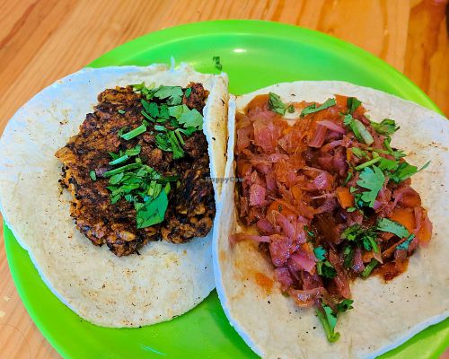a couple of tacos. tinga taco on the right is made with various vegetables. the oat chorizo taco is made with oats and mushrooms. both very tasty  at Veggie Table in Puerto Vallarta