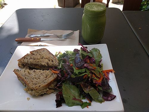 Vegan Egg Salad on toasted seeded sourdough with small side salad and Greeña Colada at Greenmouth in Easton