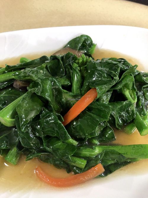 Stored fried Kai lan - clean and deep umami flavors  at Ru Lai 如来斋 in Central Singapore