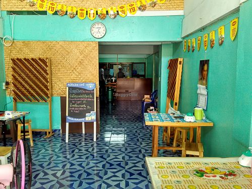 Seating and Kitchen area at Sankhongnoi Veggie in Chiang Rai