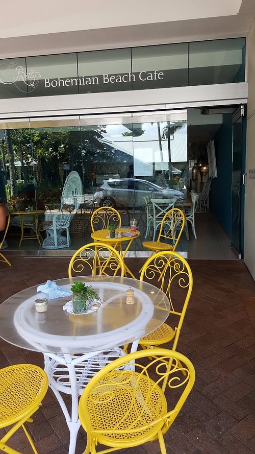 Outdoor seating at Betty's Bohemian Beach Cafe in Port Douglas