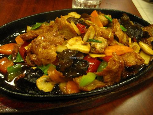 Grilled 'chicken' on sizzling plate. Very yummy, a little on the sweet side, but nothing overwhelming. at Tien Hiang in Paris