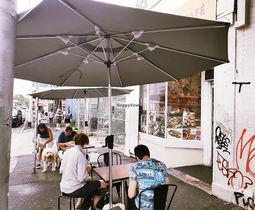A couple of outdoor tables at Trang Bakery and Cafe in Collingwood