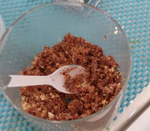 This is made from thinly shaved betel nuts, jaggery and crushed cashews and peanuts. It taste a little like chocolate. It aids digestion at Greenleaf Cafe in Central Singapore