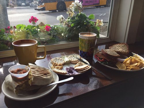 cheesy potato burrito, cream cheese plate, 701 sandwich, and coffee at 701 Coffee in Seattle