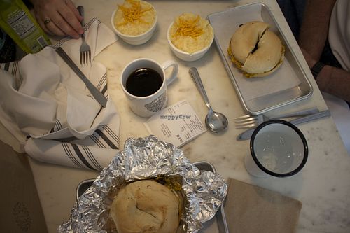 bagel sandwiches and cheesy grits. (and a cream cheese bagel, unpictured) at Gnome Cafe in Charleston