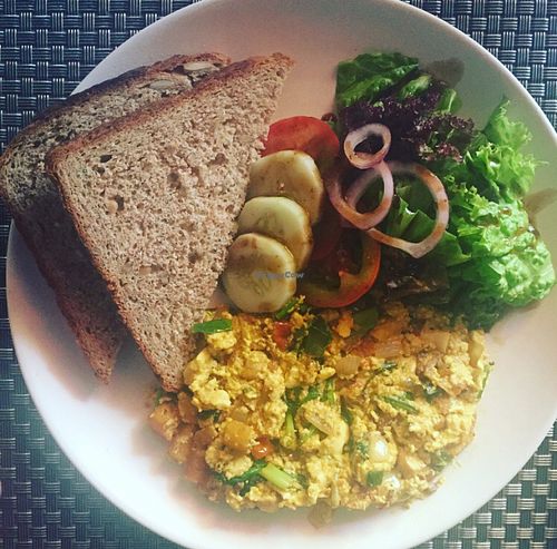 scrambled tofu & wholegrain bread  at Jalus Vegan Kitchen in Hanoi