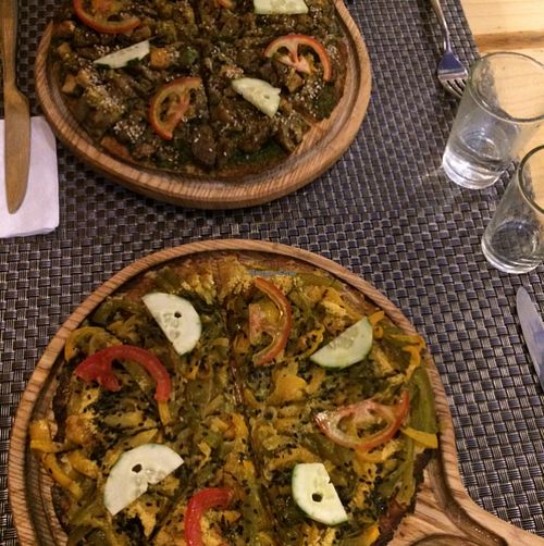 Pizzas that are quite original and very tasty. The pesto pizza wins. at Jalus Vegan Kitchen in Hanoi