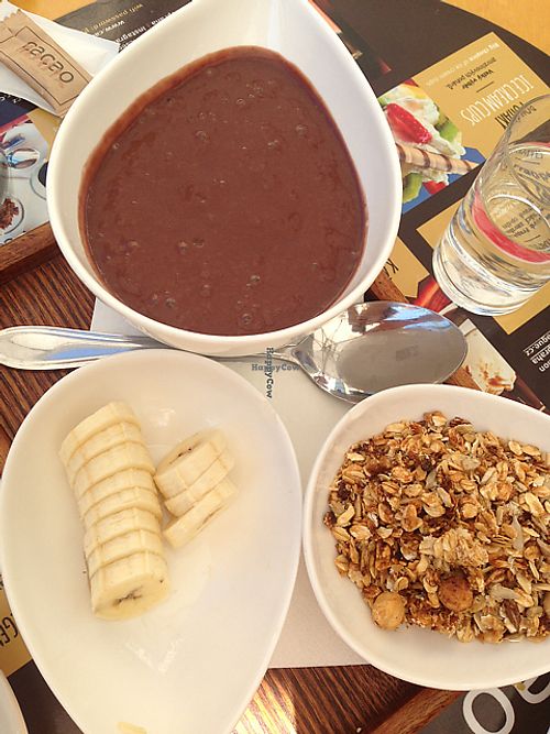 acai bowl with acai smoothie, homemade granola and fresh banana at cacao in Prague