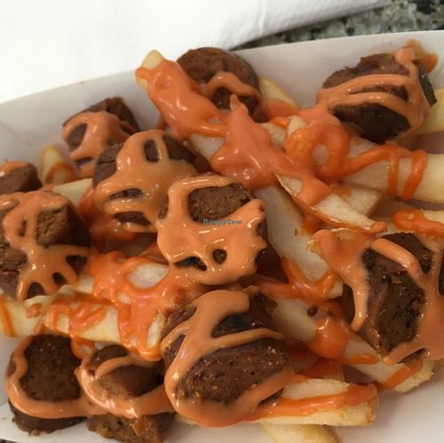 Vegan Salchipapas! (french fries topped with vegan hot dog slices and Simon's sauce) at Simon's Hot Dogs in Scottsdale