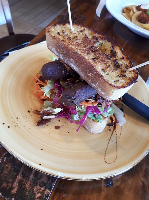 Sausage and 'bacon' sandwich at Bach on Breakwater in New Plymouth