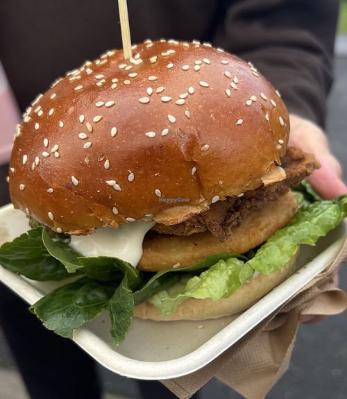 Kyiv “chick’n” burger with a potato cake. Amazing!  at Woking Amazing in Northcote