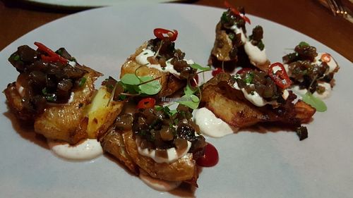 Smoked beets on potatoes at Miss Kaplan in Tel Aviv
