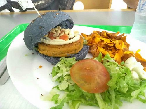 Peanut and chickpea burger with sweet potato chips and salad at Vegana Burgers - Atrium Saldanha in Lisbon