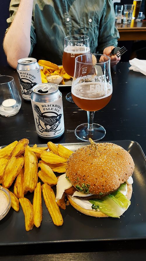 Somrig burgare: Seitan burger in sourdough bun with mayo, salad, tomato, ruccolapesto, their own mozzarella. at Blackbird in Gothenburg