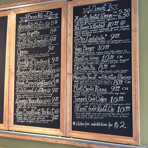 Restaurant Menu on their wall at Wild Rice Vegan Cafe in Watertown