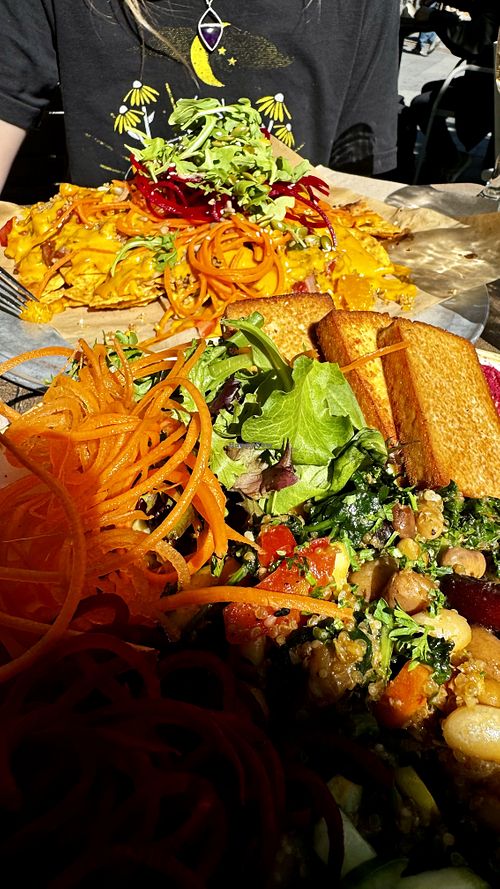 Nourishment Bowl with added Tofu and insanely good vegan nachos. 💯 recommend   at Nourish Bistro in Banff