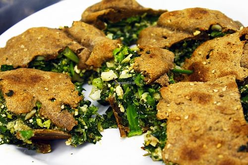 Broccoli empanada with nuts.
 at Orgânico Veg in Florianopolis