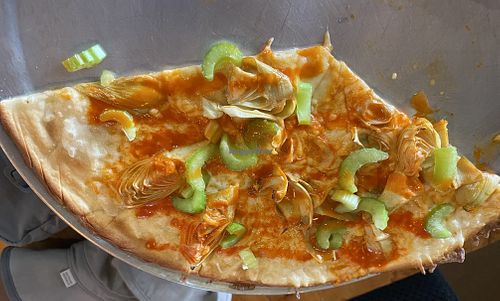  Vegan buffalo chicken pizza w/artichoke hearts sub. Forgot to take a picture before we started eating    at OV Pizza and Pints in Oro Valley