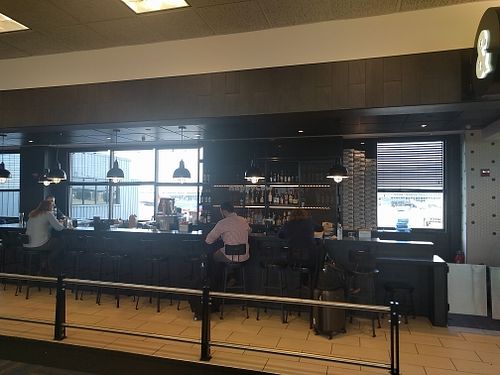 Adjacent bar. Same ownership, but need to pay separately. at IAD - &pizza - CC in Dulles