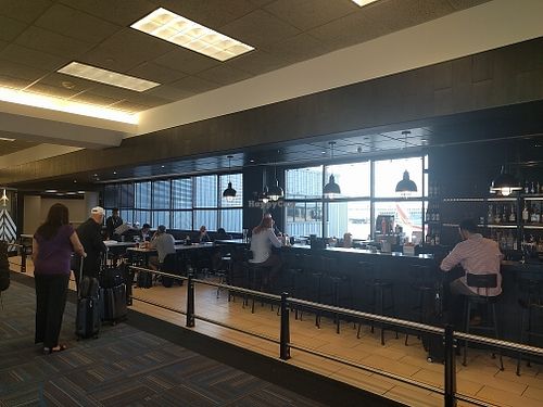 Bar and seating area at IAD - &pizza - CC in Dulles