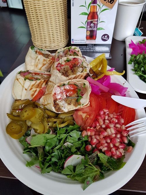 Plate with pita/wrap  at Falafel Bejrut - Nowolipki in Warsaw