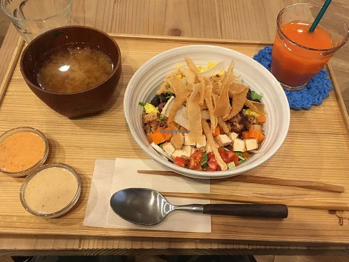 Cob salad rice bowl lunch set with two dressings, carrot juice and miso soup  at Sairam in Yokohama